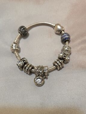 Pandora Charm Bracelet with  Charms Included